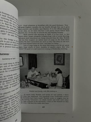 By Degrees (Signed); Around the world by tramp freighter